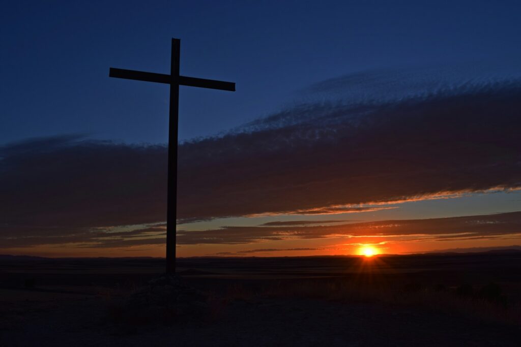 a cross on a hill